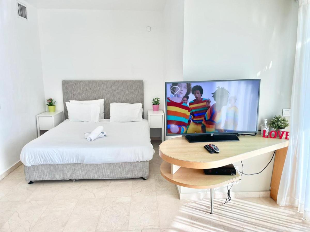 Herzelia Oceanus Apartment Hotel מראה חיצוני תמונה